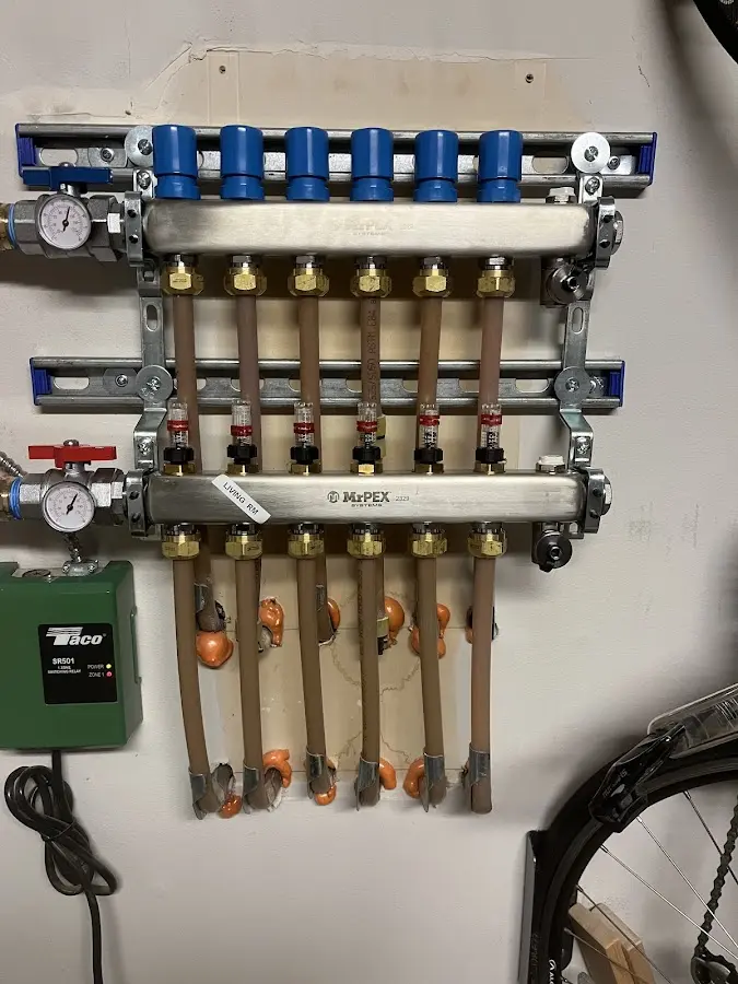 Plumber performing Water Heater Repair at a residential property in Gaines