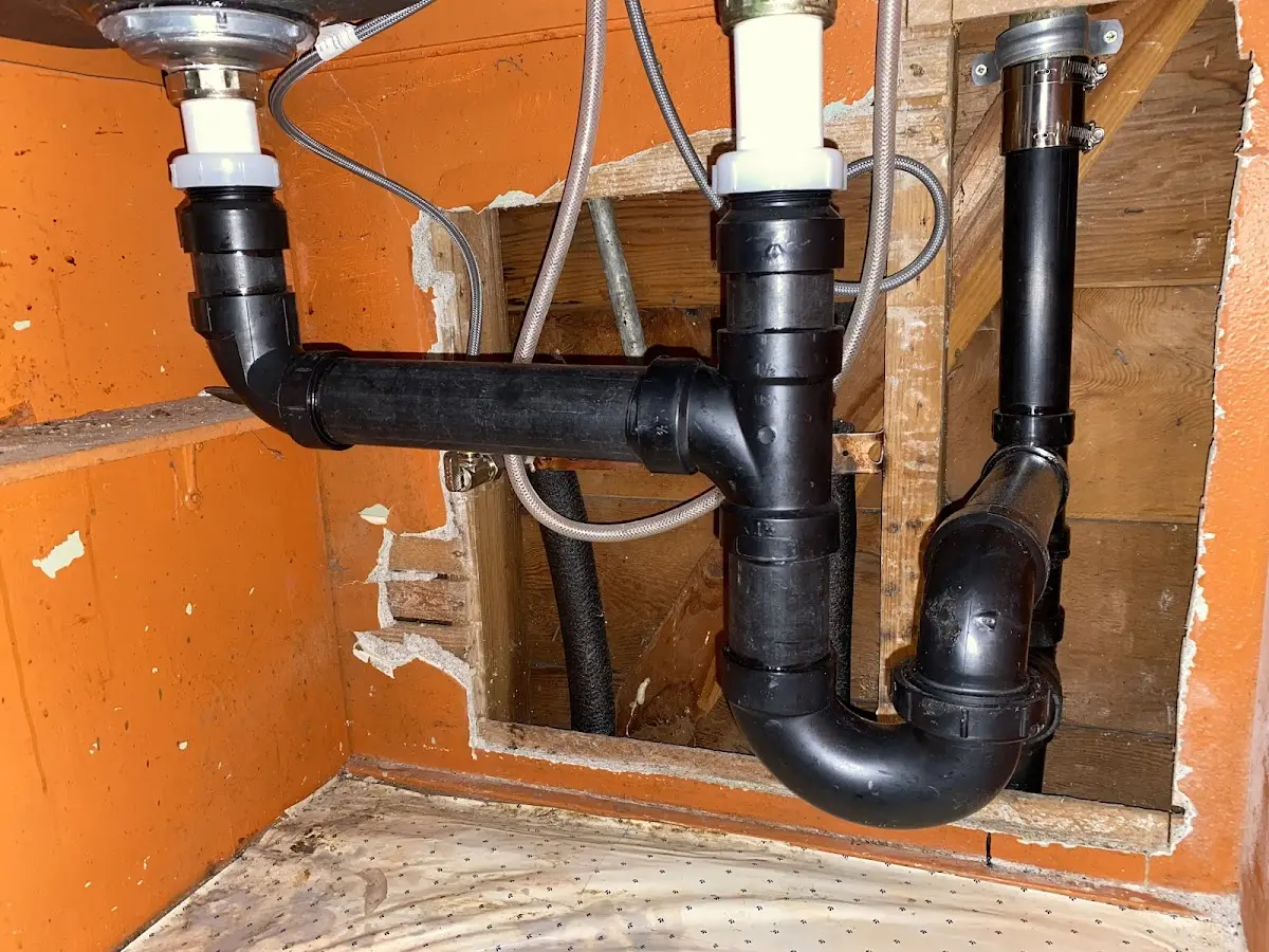 Professional Garbage Disposal Repair equipment and tools on the job in Gaines